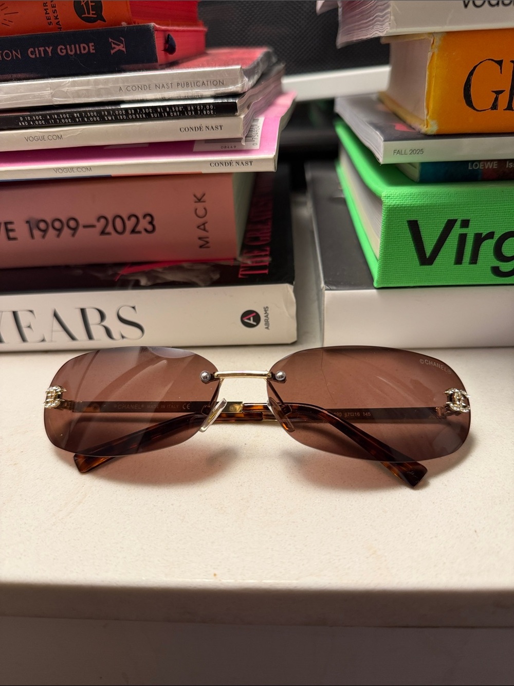 CHANEL Brown Gradient Rimless Sunglasses with Gold Accents